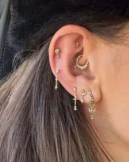 Single Starwhisper Huggie in a layered ear look