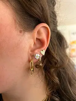 Monkey Business Hoop Earrings worn in an ear stack
